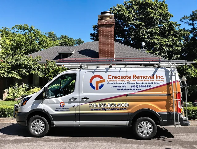 Duxbury Chimney Sweep technician removing creosote safely in Duxbury, MA
